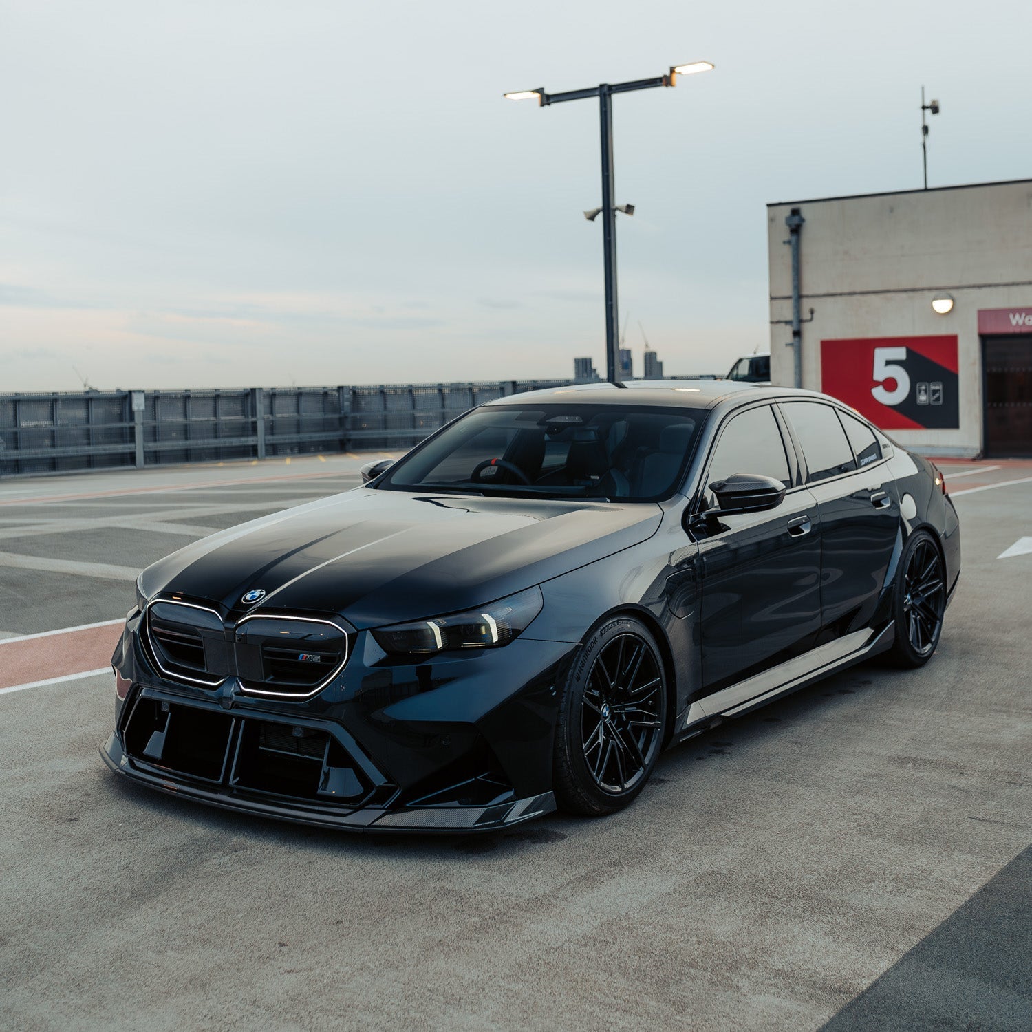 MHC+ BMW G90 & G99 M5 SP90 Front Splitter In Gloss Pre Preg Carbon Fibre