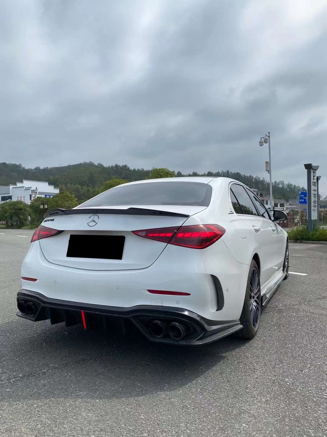 AERO CARBON - MERCEDES BENZ C CLASS W206 CARBON FIBRE SLIM LINE LED REAR DIFFUSER