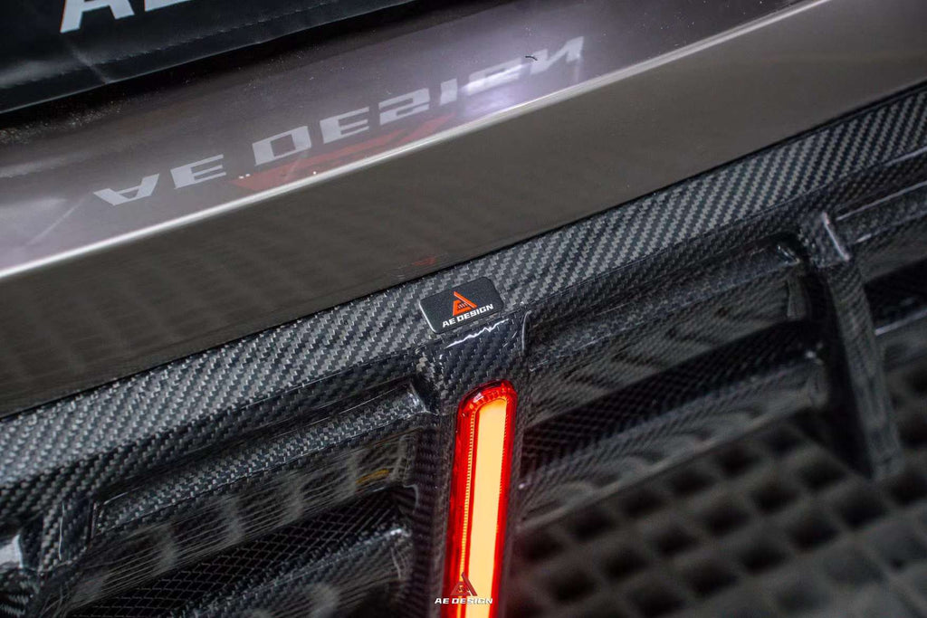 AE DESIGN - BMW 8 SERIES G14 / G15 / G16  CARBON FIBRE LED REAR DIFFUSER