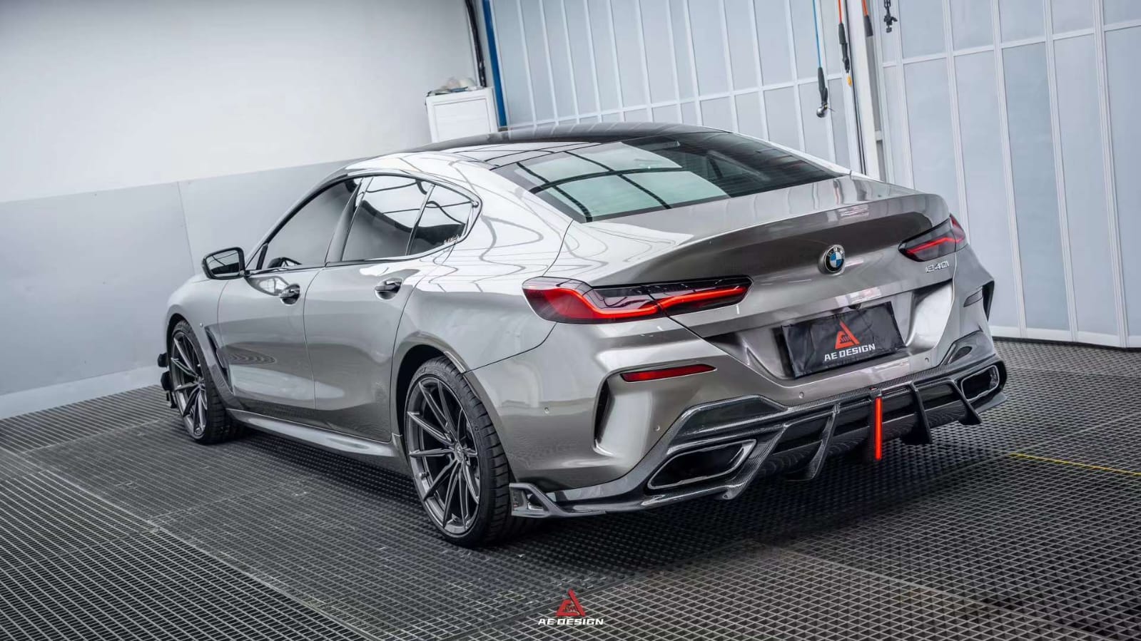 AE DESIGN - BMW 8 SERIES G14 / G15 / G16  CARBON FIBRE LED REAR DIFFUSER